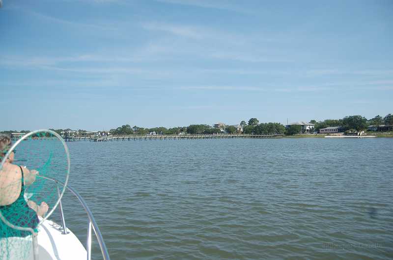 Bridge  - Spring 2006 027.JPG - The first dock is Ken's.  It sustained minor damage from Katrina, and Ken worked hard to get it and the rest of their property in shape for our visit.